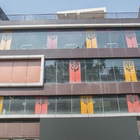 Oyo 7669 The Trinitywood Hotel Bangalore Luaran gambar