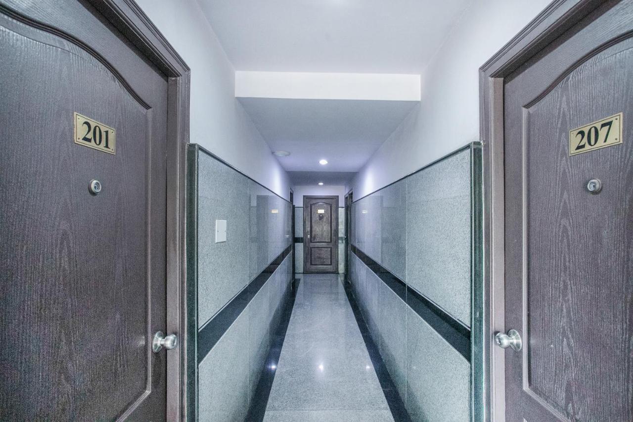 Oyo 7669 The Trinitywood Hotel Bangalore Luaran gambar