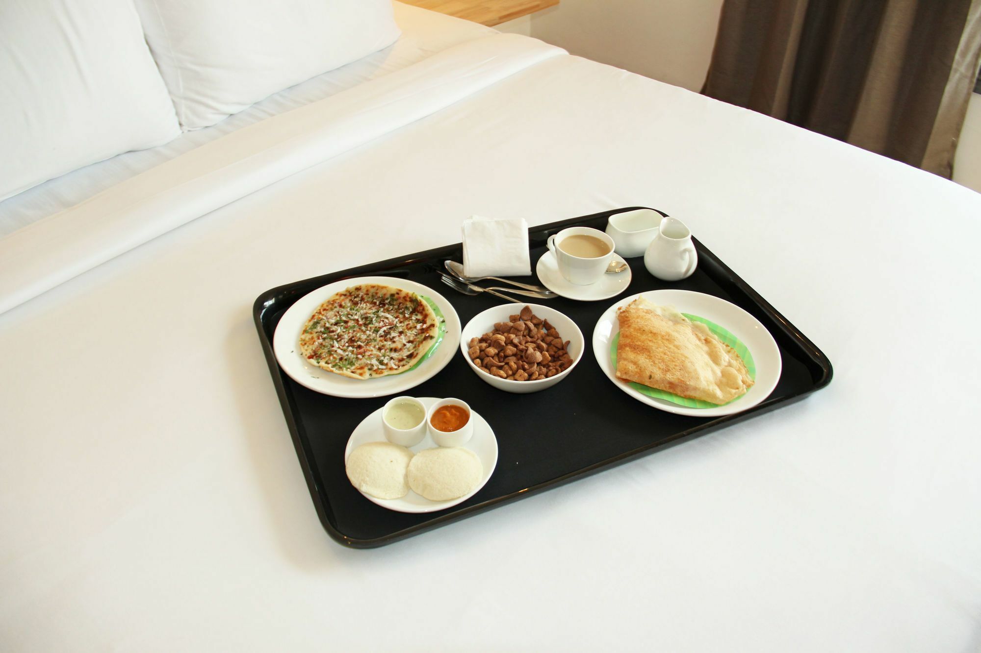 Oyo 7669 The Trinitywood Hotel Bangalore Luaran gambar